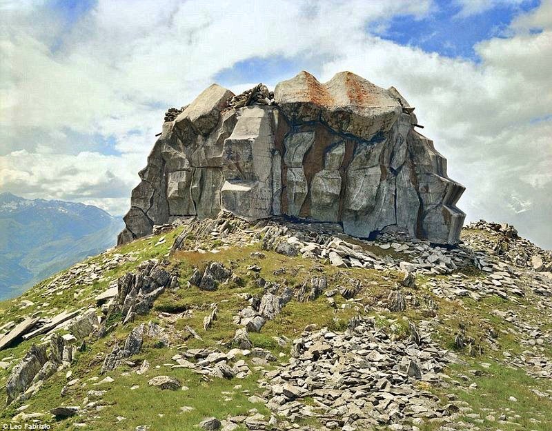 photograph of a hidden swiss bunker in the mountains