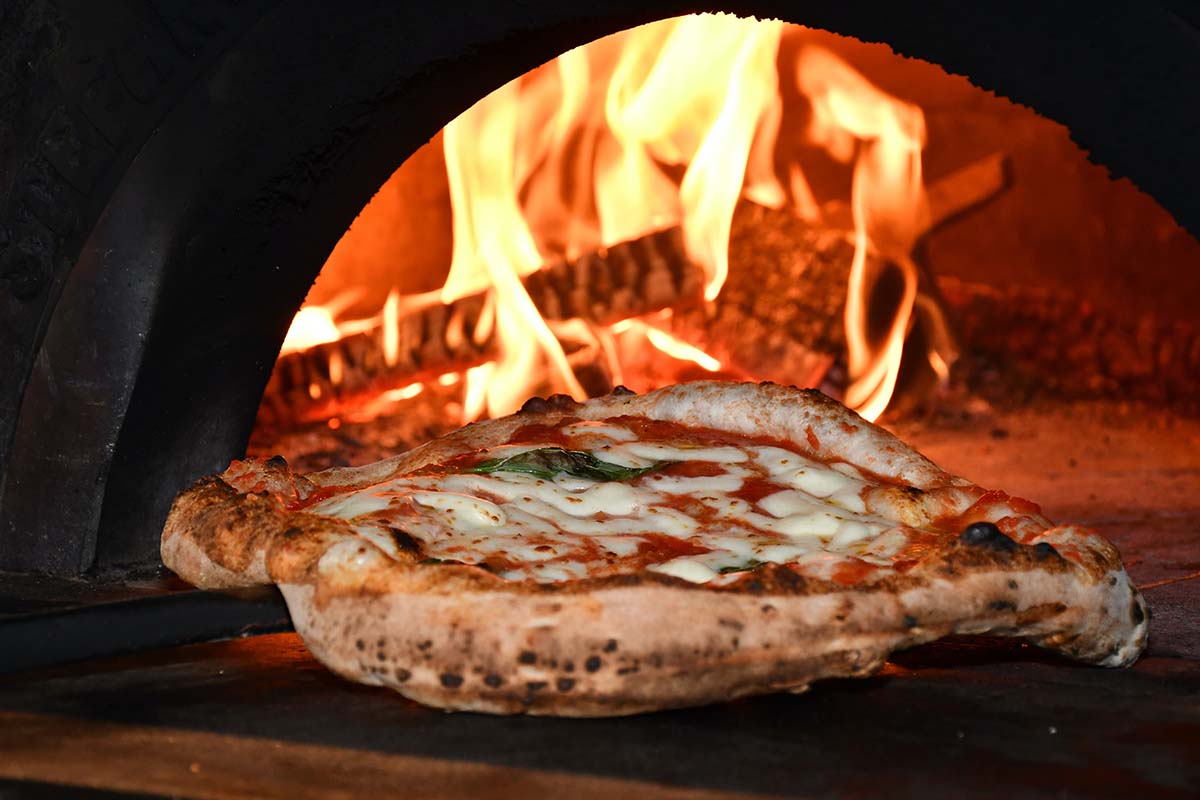 A photo of a wood fire pizza