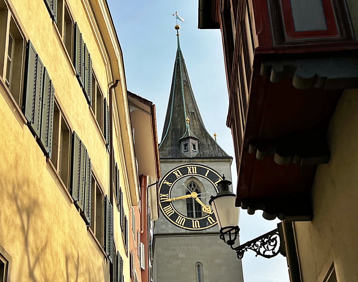 clock tower in Zurich in alleyway