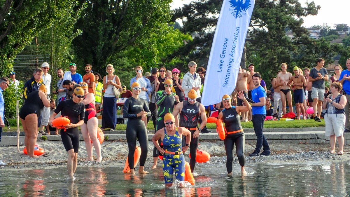 swimmers entering lac leman