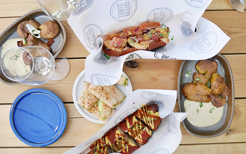 aerial view of a hotdog and appetizers